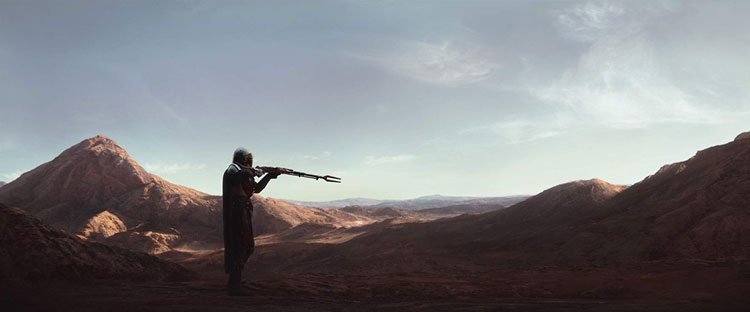 مندلوری در حال نگه داشتن تفنگ بزرگ مقابل کوه ها در سریال مندلورین دیزنی در جهان جنگ ستارگان